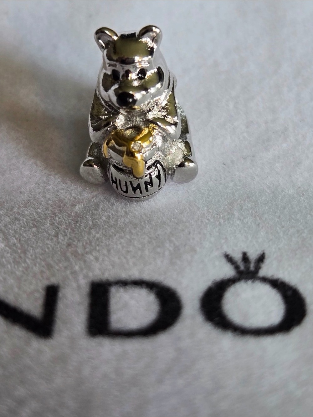 Adorable Pandora x Disney 100th Anniversary Winnie the Pooh charm featuring Pooh